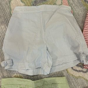 Bella Bliss blue/white seersucker shorts. Size 8. Adorable bows bottom. Pockets
